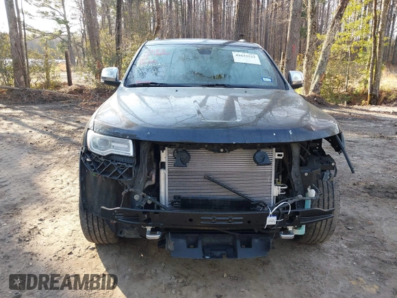 2015 Jeep Grand Cherokee Overland with VIN 1C4RJECGXFC957530, listed as a IAAI auction lot 41633522 with 168,258 mi miles and . Bid and sale history available at DreamBid. Image 6.