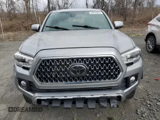 2018 Toyota Tacoma SR z VIN 3TMCZ5AN2JM122416, wystawiony jako Copart lot #50816965 z przebiegiem Nie podano mil oraz Szkoda całkowita • Salvage title. Historia ofert i sprzedaży dostępna na DreamBid. Obrazek 5.