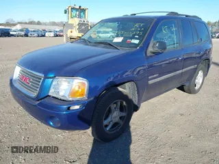 2006 GMC Envoy SLT with VIN 1GKDT13S762170322, listed as a IAAI auction lot 41324540 with 999,999 mi miles. Bid and sale history available at carsss.com. Image 16.