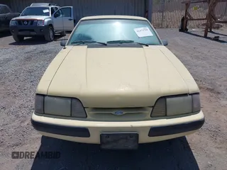 1988 Ford Mustang z VIN 1FABP41AXJF163469, wystawiony jako IAAI lot #42473799 z przebiegiem 89 307 mil mil oraz . Historia ofert i sprzedaży dostępna na DreamBid. Obrazek 6.
