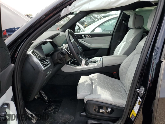 2023 BMW X5 xDrive45e with VIN 5UXTA6C04P9S03633, listed as a Copart auction lot 54916645 with Not provided miles and Salvage title. Bid and sale history available at DreamBid. Image 7.