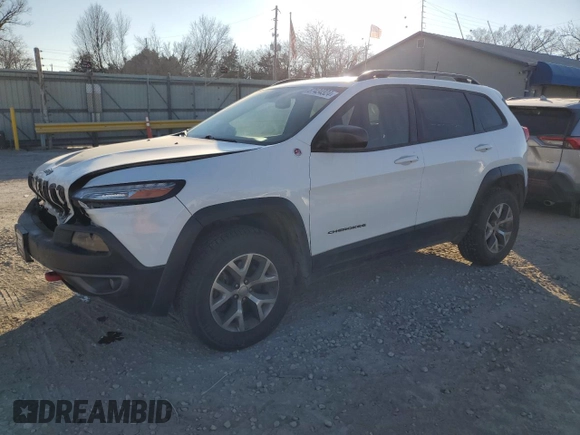 2016 Jeep Cherokee Trailhawk z VIN 1C4PJMBS2GW334801, wystawiony jako Copart lot #87434324 z przebiegiem 92 887 mil mil oraz Szkoda całkowita • Salvage title. Historia ofert i sprzedaży dostępna na DreamBid. Obrazek 1.
