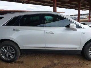 2021 Cadillac XT5 FWD Premium Luxury with VIN 1GYKNCRS5MZ224957, listed as a IAAI auction lot 41794648 with 28,540 mi miles and . Bid and sale history available at carsss.com. Image 13.