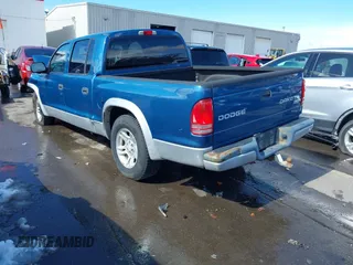 2003 Dodge Dakota SLT with VIN 1D7HL48N73S333828, listed as a IAAI auction lot 41748642 with 163,258 mi miles. Bid and sale history available at carsss.com. Image 3.