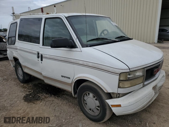 2000 GMC Safari z VIN 1GDDM19W3YB518506, wystawiony jako Copart lot #80923314 z przebiegiem 303 166 mil mil oraz Szkody całkowita. Historia ofert i sprzedaży dostępna na DreamBid. Obrazek 4.