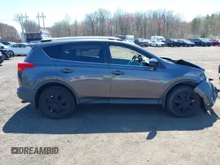 2015 Toyota RAV4 LE with VIN JTMBFREV4FJ037989, listed as a IAAI auction lot 42063957 with 93,201 mi miles and . Bid and sale history available at DreamBid. Image 13.