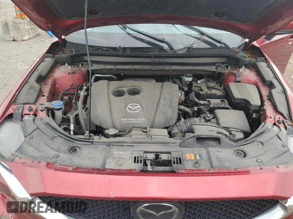 2019 Mazda CX-5 Grand Touring z VIN JM3KFBDM2K0665993, wystawiony jako Copart lot #58440685 z przebiegiem 38 306 mil mil oraz Szkoda całkowita • Salvage title. Historia ofert i sprzedaży dostępna na DreamBid. Obrazek 11.