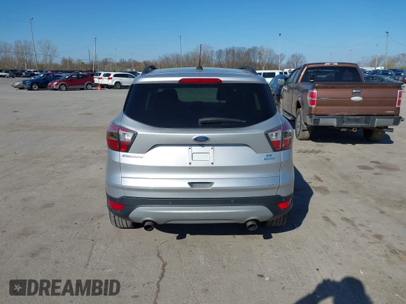 2017 Ford Escape SE with VIN 1FMCU0GDXHUB27848, listed as a IAAI auction lot 42047589 with 128,823 mi miles. Bid and sale history available at carsss.com. Image 16.