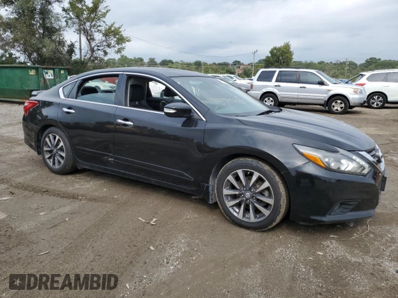 2016 Nissan Altima SV with VIN 1N4AL3AP1GC272239, listed as a Copart auction lot 74732064 with 67,541 mi miles and Salvage Title. Bid and sale history available at DreamBid. Image 4.