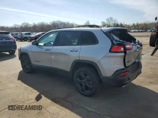2015 Jeep Cherokee Latitude Altitude with VIN 1C4PJMCSXFW774925, listed as a Copart auction lot 53368365 with 104,645 mi miles and Salvage Title. Bid and sale history available at carsss.com. Image 2.