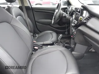 2020 MINI Hardtop 4 Door Cooper with VIN WMWXU7C04L2L58635, listed as a IAAI auction lot 42383785 with 27,160 mi miles and . Bid and sale history available at DreamBid. Image 5.