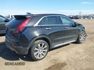 2023 Cadillac XT4 AWD Premium Luxury with VIN 1GYFZDR46PF195391, listed as a IAAI auction lot 41848429 with 31,904 mi miles and . Bid and sale history available at carsss.com. Image 4.