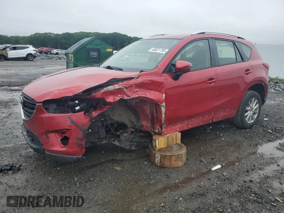 2016 Mazda CX-5 Sport with VIN JM3KE4BY1G0768530, listed as a Copart auction lot 60521795 with 118,132 mi miles and Salvage title. Bid and sale history available at DreamBid. Image 1.