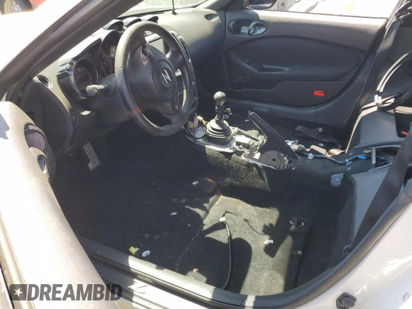 2016 Nissan 370Z with VIN JN1AZ4EH0GM933290, listed as a Copart auction lot 62025304 with 100,275 mi miles and Salvage Title. Bid and sale history available at carsss.com. Image 7.
