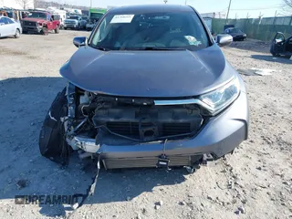2018 Honda CR-V EX with VIN 7FARW2H55JE102385, listed as a IAAI auction lot 41768265 with 65,380 mi miles. Bid and sale history available at carsss.com. Image 6.