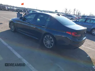 2018 BMW 5 Series M550i xDrive with VIN WBAJB9C55JB049529, listed as a IAAI auction lot 41241917 with 116,265 mi miles and . Bid and sale history available at carsss.com. Image 3.