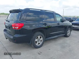 2010 Toyota Sequoia SR5 with VIN 5TDZM5G13AS002430, listed as a IAAI auction lot 42128187 with 230,817 mi miles. Bid and sale history available at carsss.com. Image 4.