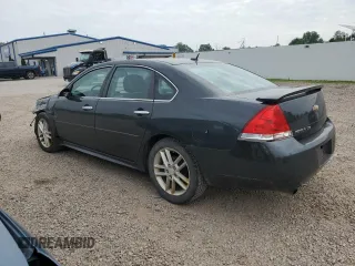 2014 Chevrolet Impala LTZ with VIN 2G1WC5E3XE1185115, listed as a Copart auction lot 60690785 with 119,947 mi miles and Salvage title. Bid and sale history available at DreamBid. Image 2.