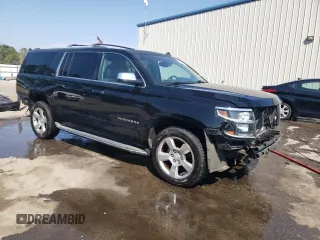2015 Chevrolet Suburban LTZ with VIN 1GNSKKKC2FR210780, listed as a Copart auction lot 47207445 with 163,448 mi miles and Salvage Title. Bid and sale history available at carsss.com. Image 4.