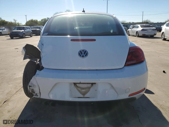 2012 Volkswagen Beetle 2.5L with VIN 3VWJX7AT0CM659261, listed as a Copart auction lot 79513824 with 144,537 mi miles and Salvage Title. Bid and sale history available at carsss.com. Image 6.