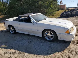 1987 Ford Mustang with VIN 1FABP40E6HF228235, listed as a Copart auction lot 76833284 with 95,222 mi miles and Salvage title. Bid and sale history available at DreamBid. Image 4.