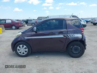 2012 Scion iQ with VIN JTNJJXB0XCJ021245, listed as a IAAI auction lot 42463167 with 158,901 mi miles and . Bid and sale history available at DreamBid. Image 14.