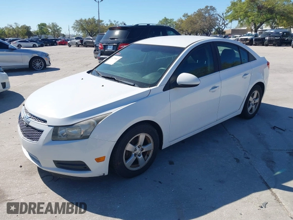 2014 Chevrolet Cruze 1LT z VIN 1G1PC5SB2E7425955, wystawiony jako IAAI lot #41771467 z przebiegiem 125 816 mil mil oraz . Historia ofert i sprzedaży dostępna na DreamBid. Obrazek 2.