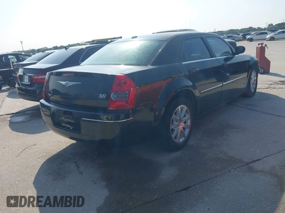 2009 Chrysler 300 Touring with VIN 2C3LA53V49H508404, listed as a IAAI auction lot 42042637 with 171,356 mi miles and . Bid and sale history available at DreamBid. Image 4.