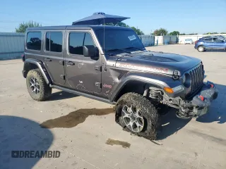 2018 Jeep Wrangler Unlimited Rubicon z VIN 1C4HJXFN3JW236121, wystawiony jako Copart lot #60930565 z przebiegiem 128 727 mil mil oraz Szkoda całkowita • Salvage title. Historia ofert i sprzedaży dostępna na DreamBid. Obrazek 4.
