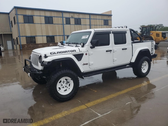 2022 Jeep Gladiator Rubicon with VIN 1C6JJTBG5NL152818, listed as a Copart auction lot 57170834 with 9,579 mi miles and Salvage Title. Bid and sale history available at carsss.com. Image 1.