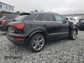 2017 Audi Q3 Prestige with VIN WA1GCCFS7HR001163, listed as a Copart auction lot 58800655 with 52,034 mi miles and Salvage title. Bid and sale history available at DreamBid. Image 3.