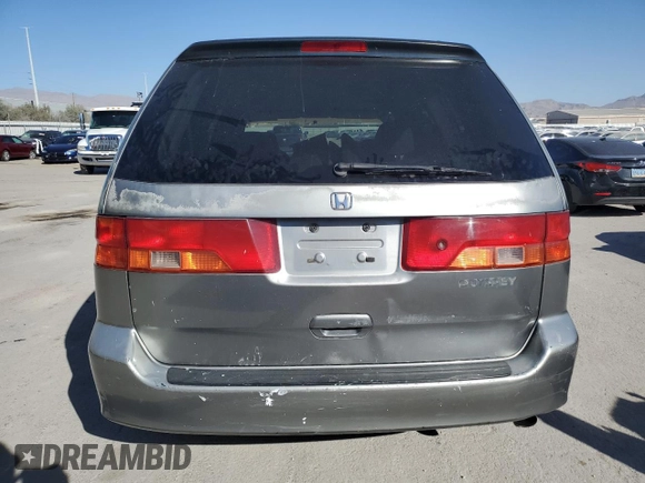 1999 Honda Odyssey EX z VIN 2HKRL1865XH549123, wystawiony jako Copart lot #44241975 z przebiegiem 165 767 mil mil oraz Szkoda całkowita • Salvage title. Historia ofert i sprzedaży dostępna na DreamBid. Obrazek 6.
