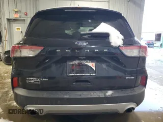 2021 Ford Escape Titanium with VIN 1FMCU9J91MUA57451, listed as a Copart auction lot 44678135 with 74,795 mi miles and Salvage title. Bid and sale history available at DreamBid. Image 6.