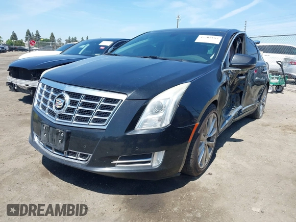 2013 Cadillac XTS Luxury z VIN 2G61R5S32D9226506, wystawiony jako IAAI lot #42208105 z przebiegiem 140 255 mil mil oraz . Historia ofert i sprzedaży dostępna na DreamBid. Obrazek 2.