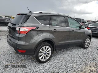2018 Ford Escape Titanium with VIN 1FMCU9J90JUA75550, listed as a Copart auction lot 63339315 with Not provided miles and Clean title. Bid and sale history available at DreamBid. Image 3.