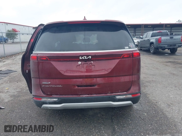 2022 Kia Carnival EX with VIN KNDNC5H36N6097184, listed as a IAAI auction lot 41024289 with 58,722 mi miles and . Bid and sale history available at DreamBid. Image 16.