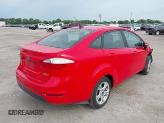2015 Ford Fiesta SE with VIN 3FADP4BJ9FM129246, listed as a IAAI auction lot 42177812 with 87,925 mi miles. Bid and sale history available at carsss.com. Image 4.