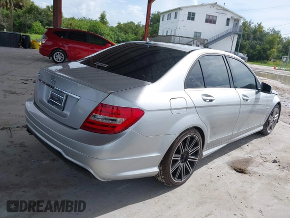 2012 Mercedes-Benz C-Class C 250 Sport with VIN WDDGF4HB8CA704655, listed as a IAAI auction lot 40293590 with 156,117 mi miles. Bid and sale history available at carsss.com. Image 4.