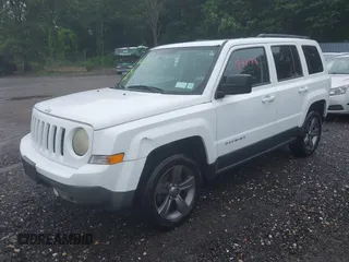 2015 Jeep Patriot High Altitude with VIN 1C4NJRFB9FD214986, listed as a IAAI auction lot 42668098 with 154,160 mi miles and . Bid and sale history available at DreamBid. Image 2.