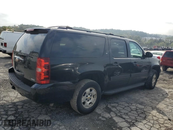 2009 Chevrolet Suburban LT w/1LT with VIN 1GNFK26349R280071, listed as a Copart auction lot 74258504 with 166,122 mi miles and Salvage Title. Bid and sale history available at carsss.com. Image 3.