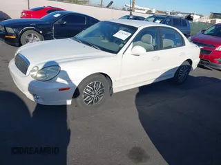 2004 Hyundai Sonata with VIN KMHWF25S84A016263, listed as a IAAI auction lot 41767003 with 140,301 mi miles. Bid and sale history available at carsss.com. Image 2.