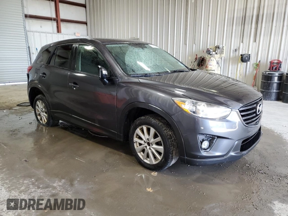 2016 Mazda CX-5 Touring with VIN JM3KE4CY3G0716346, listed as a Copart auction lot 51467895 with 133,218 mi miles and Salvage Title. Bid and sale history available at carsss.com. Image 4.
