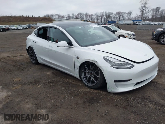 2020 Tesla Model 3 Standard Range Plus with VIN 5YJ3E1EA7LF659172, listed as a IAAI auction lot 42017026 with 32,104 mi miles. Bid and sale history available at carsss.com. Image 1.