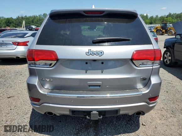 2018 Jeep Grand Cherokee Overland with VIN 1C4RJFCG2JC212947, listed as a Copart auction lot 59503405 with 76,436 mi miles and Clean title. Bid and sale history available at DreamBid. Image 6.