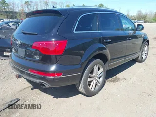 2014 Audi Q7 Premium Plus with VIN WA1LGAFE5ED014701, listed as a IAAI auction lot 42107552 with 98,919 mi miles and . Bid and sale history available at DreamBid. Image 4.