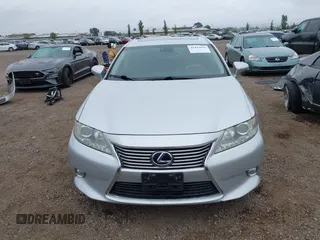 2013 Lexus ES 300h z VIN JTHBW1GG2D2009503, wystawiony jako IAAI lot #42429692 z przebiegiem 265 312 mil mil oraz . Historia ofert i sprzedaży dostępna na DreamBid. Obrazek 13.