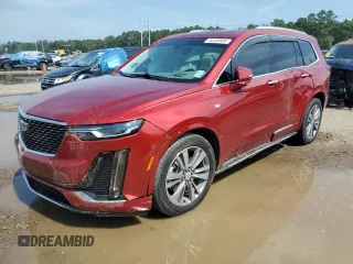 2022 Cadillac XT6 Premium Luxury with VIN 1GYKPCRS7NZ101706, listed as a Copart auction lot 63389985 with 27,021 mi miles and Salvage title. Bid and sale history available at DreamBid. Image 1.
