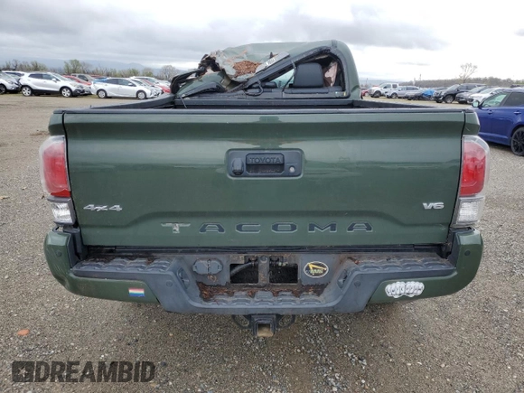 2021 Toyota Tacoma 4WD SR5 with VIN 3TMDZ5BNXMM099474, listed as a Copart auction lot 49325385 with 57,853 mi miles and Salvage Title. Bid and sale history available at carsss.com. Image 6.