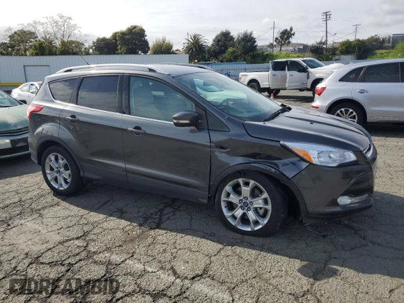 2015 Ford Escape Titanium with VIN 1FMCU0J98FUA46879, listed as a Copart auction lot 51173555 with 72,093 mi miles and Salvage Title. Bid and sale history available at DreamBid. Image 4.