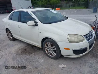 2007 Volkswagen Jetta Wolfsburg Edition z VIN 3VWEF71K47M192184, wystawiony jako IAAI lot #42573483 z przebiegiem 207 809 mil mil oraz . Historia ofert i sprzedaży dostępna na DreamBid. Obrazek 6.